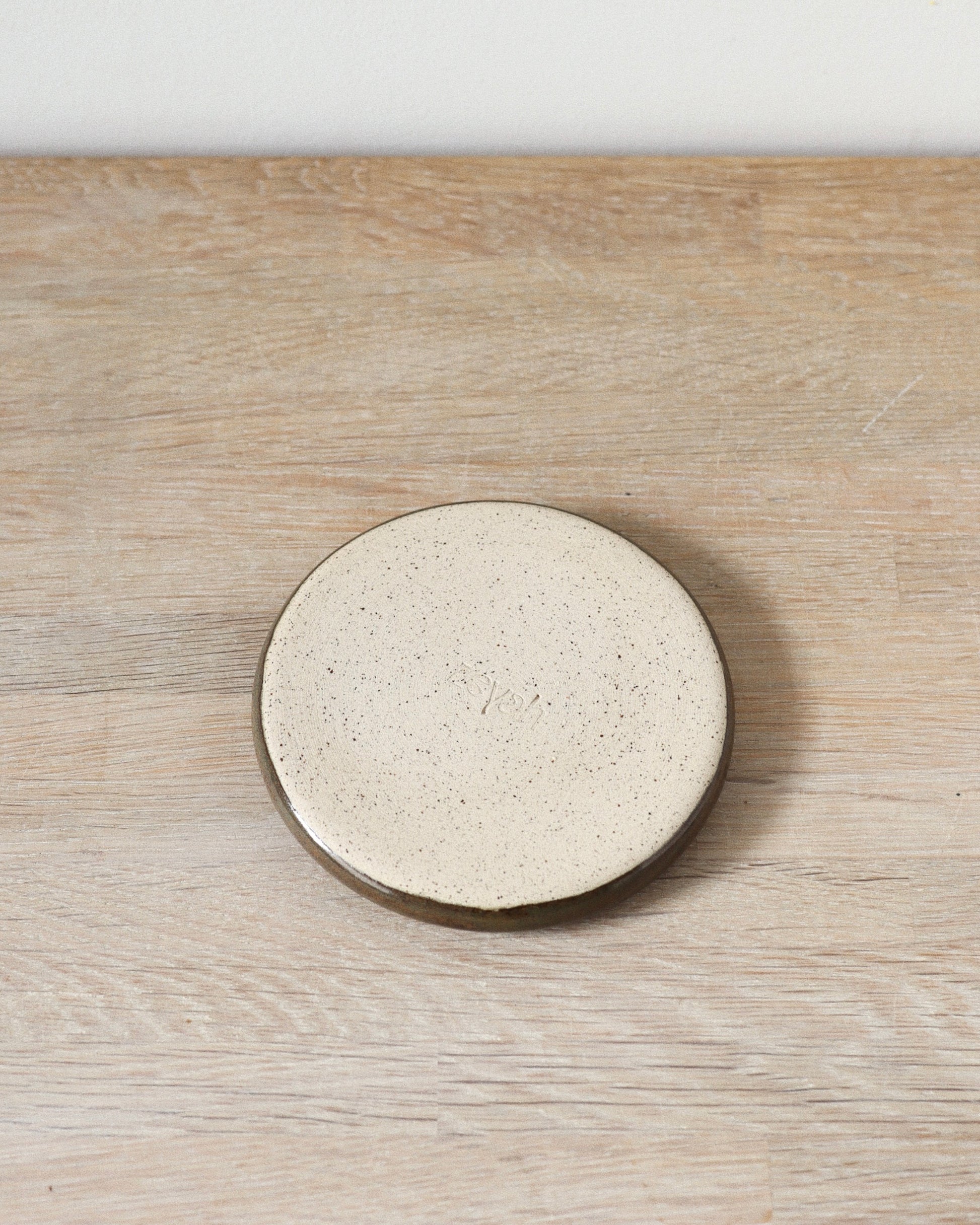 Terra Jewelry Dish – handmade speckled stoneware dish in warm Terra Rust glaze, crafted in Amsterdam by Zeyah Ceramics.