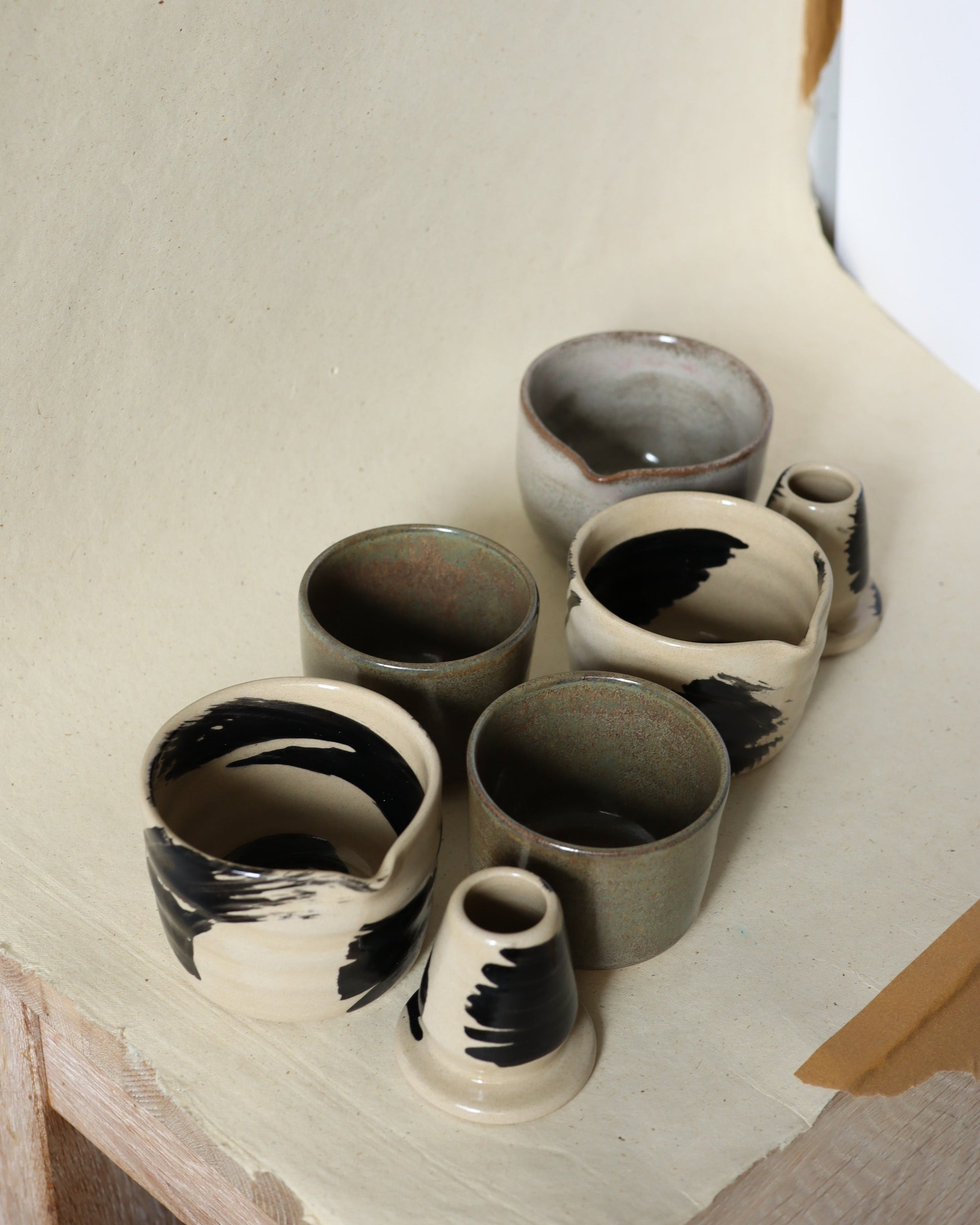 stoneware ceramic matcha set in black underglazed brush strokes, ceramics handmade in amsterdam