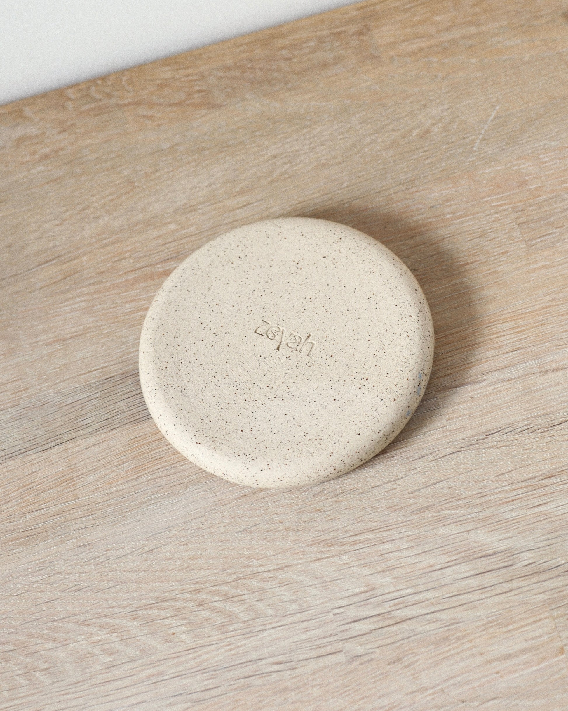 Grimaud Jewelry Dish – handmade speckled white stoneware dish with clear glaze, crafted in Amsterdam by Zeyah Ceramics.