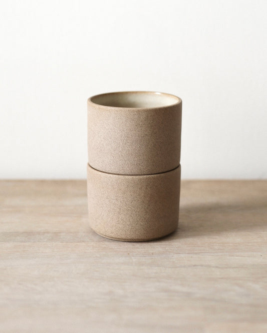 Terra Espresso Cup Set – handmade toffee stoneware cups with raw unglazed exterior and matte white glazed interior, crafted in Amsterdam by Zeyah Ceramics.