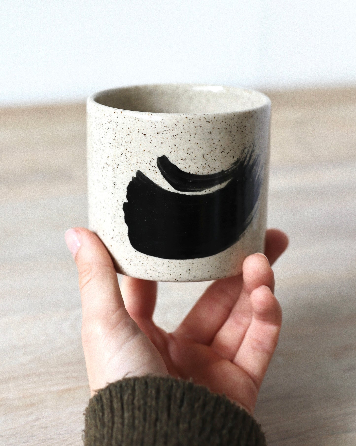 Speckled Brush-Stroked Set – handmade speckled white stoneware cup pair with expressive brush-strokes and clear glaze, crafted in Amsterdam by Zeyah Ceramics.