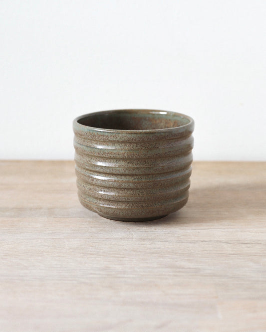 Terra Espresso Cup – handmade stoneware espresso cup with a brown, green glaze, 180 ml capacity, crafted in Amsterdam by Zeyah Ceramics.